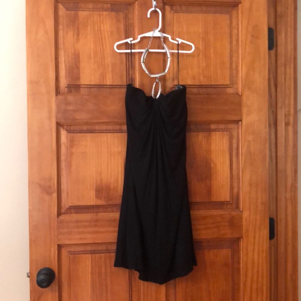 Black mini dress with silver necklace halter